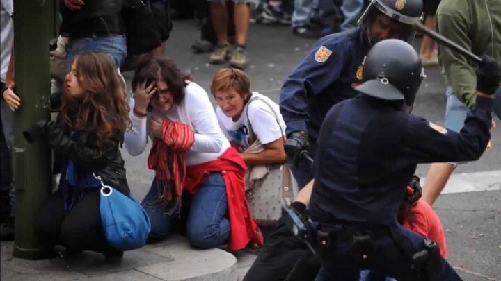This image has an empty alt attribute; its file name is Catalonia-Police-brutality-1.jpg